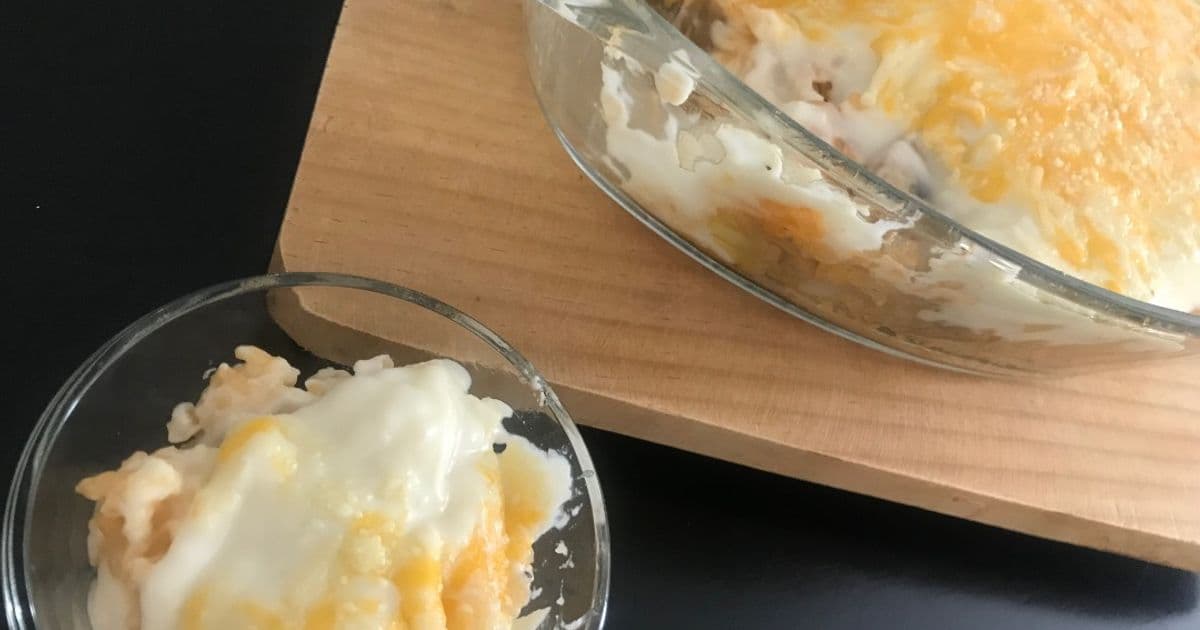 Receta de Arroz caldoso con queso gratinado preparada paso a paso — fotografía editorial de RecetaGenial